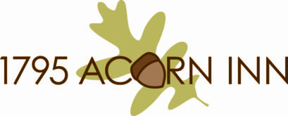 1795 Acorn Inn Bed and Breakfast logo with green leaf and brown acorn
